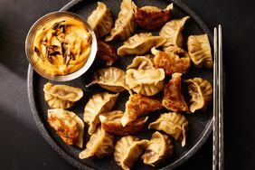 Beef and Onion Dumplings with Burnt Scallion Gochujang Mayo