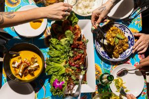 People enjoying various dishes at Yotaka Martin's Lom Wong in Phoenix. 