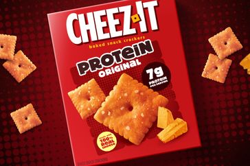 CheezIt Protein Original snack crackers box with crackers and cheese slices around it