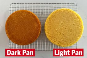 Two cakes on a wire rack labeled Dark Pan and Light Pan to show differences in baking results