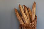 A basket of baguettes from Leviathan bakery