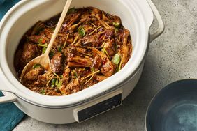 A pork shoulder cooked in a soy sauce and vinegar sauce in a slow cooker. 