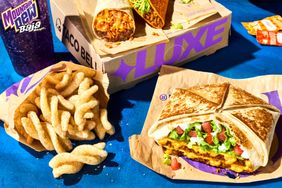 Taco Bell meal including a Crunchwrap fries and a Mountain Dew Baja Blast
